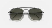 Gunmetal hexagonal sunglasses with dark gray-green lenses and central bridge detail