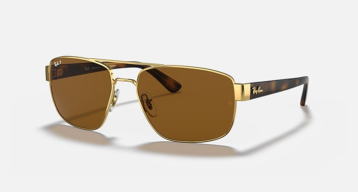 Ray-Ban RB3663 gold sunglasses with brown tinted lenses, angled side view