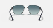 Front view sunglasses with gunmetal frame and blue gradient lenses, curved brow bar
