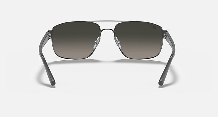 Sunglasses with dark brown gradient lenses and gunmetal frame, front view
