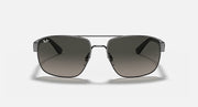 Sunglasses with brown-to-dark gradient lenses and gunmetal frame, rounded rectangular shape