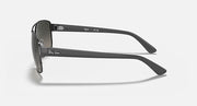Side-profile sunglasses with dark gradient lenses and gunmetal metal temples