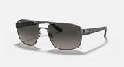 Angled sunglasses with gunmetal frame and blue-gradient lenses, metal nose bridge