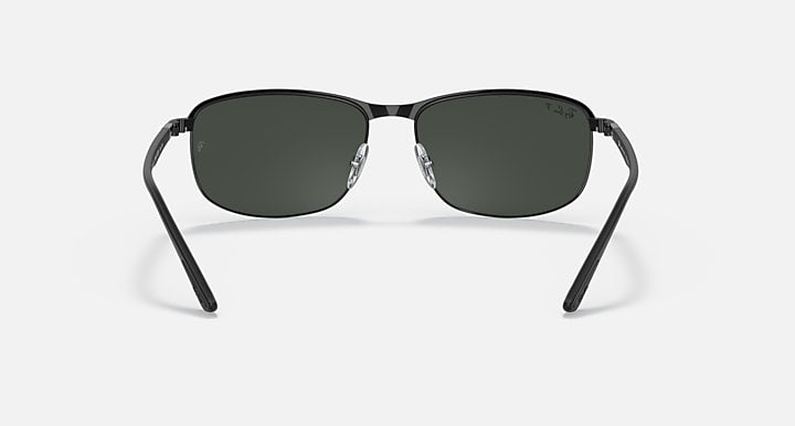 Polarized sunglasses with dark lenses and black frame, front view.