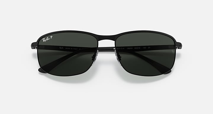 Polarized sunglasses with dark tinted lenses and black frame, straight on.
