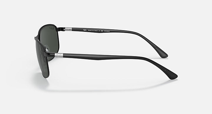 Polarized sunglasses with dark lenses and black frame, side profile.