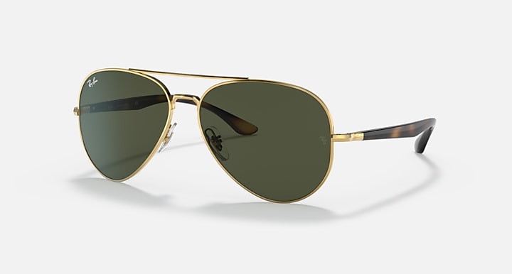 Ray-Ban aviator sunglasses with gold frame and dark green mirrored lenses