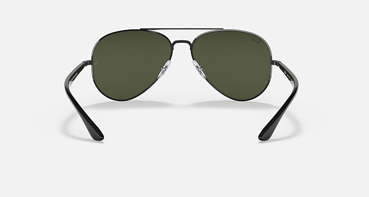 Ray-Ban aviator sunglasses with dark green lenses and dark metal frame, front view with temples visible.