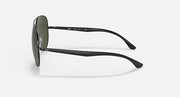 Ray-Ban aviator sunglasses with dark green lens and black metal frame, side profile view.