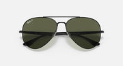 Ray-Ban aviator sunglasses with dark green lenses and dark metal frame, straight on view.