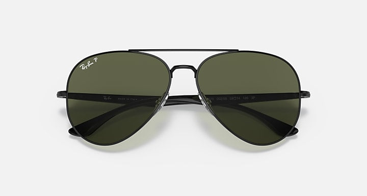 Ray-Ban aviator sunglasses with dark green lenses and dark metal frame, straight on view.