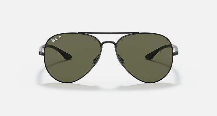 Ray-Ban aviator sunglasses with dark green lenses and dark metal frame, front view.