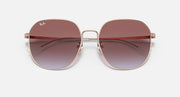 Ray-Ban round sunglasses in rose gold with brown gradient lenses and logo on top
