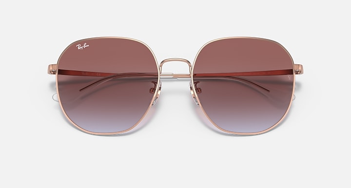 Ray-Ban round sunglasses in rose gold with brown gradient lenses and logo on top