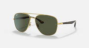 Ray-Ban aviator sunglasses with gold frame and dark green lenses, tortoise-style temples