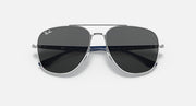 Silver-tone aviator sunglasses with dark lenses and thin blue accents.
