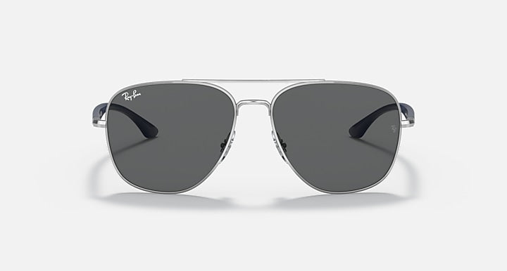 Silver-tone aviator sunglasses with dark gray lenses, front view.
