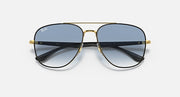 Gold-tone aviator sunglasses with dark lenses and black temple tips.