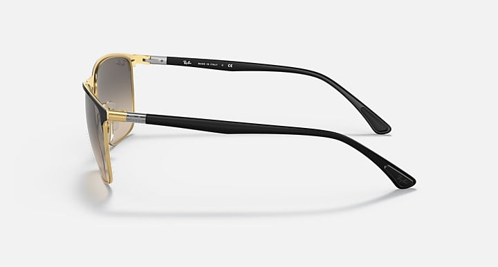Ray-Ban RB3686 sunglasses, side view, gold frame with black temples