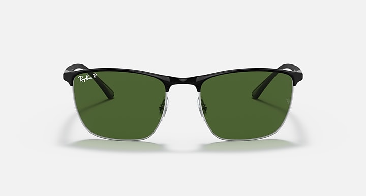 Sunglasses with green lenses and black frame, front view