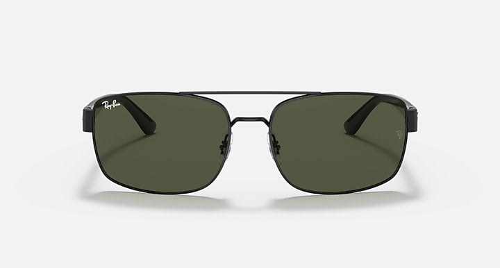 Black rectangular sunglasses with green gradient lenses and thin frame bridge, front view.