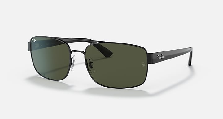 Black sunglasses with green gradient lenses, rectangular rounded shape, side arms visible.