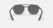 Round sunglasses with dark gray lenses and black metal frame, front-facing angle