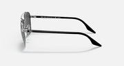Round sunglasses, black metal frame with dark lenses, temple and bridge profile