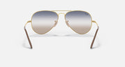 Aviator sunglasses with gradient lenses and gold metal frame, front view