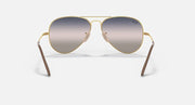 Aviator metal sunglasses with gold frame and dark gradient mirrored lenses