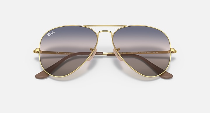 Ray-Ban aviator sunglasses with gold metal bridge and mirrored dark lenses