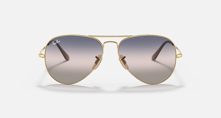 Aviator metal sunglasses with gold frame and mirrored gray lenses