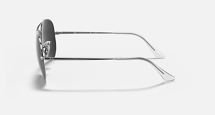 Ray-Ban aviator metal sunglasses with dark lenses and gunmetal frame, left side profile