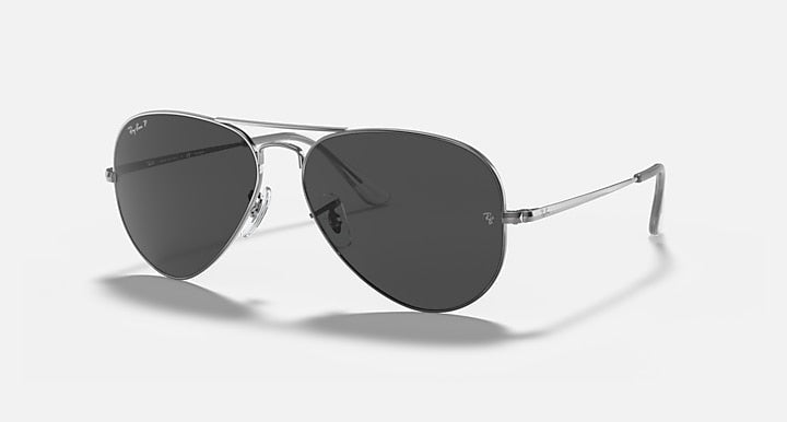 Ray-Ban aviator metal sunglasses with dark lenses and gunmetal frame, side view