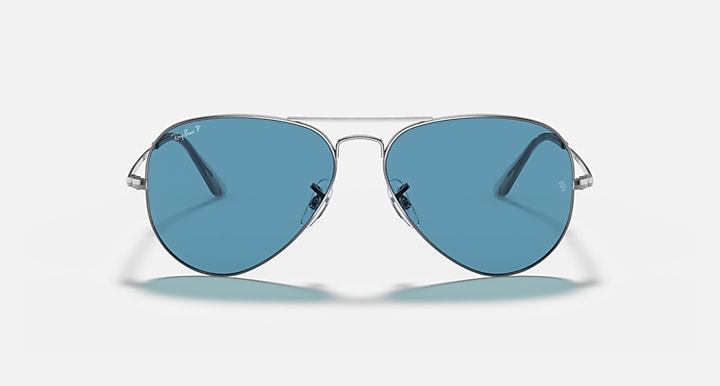 Aviator sunglasses with blue mirrored lenses, silver metal frame, bridge detail