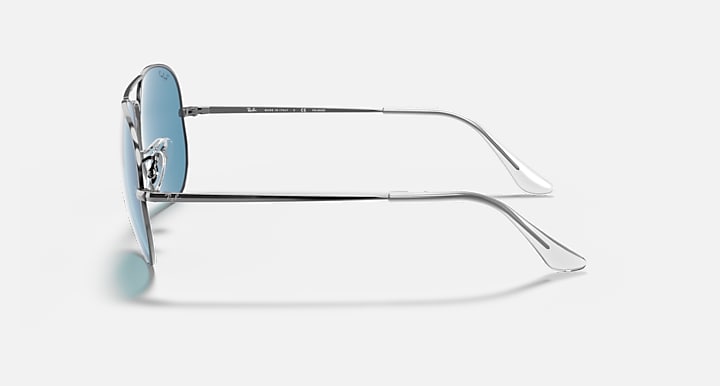 Ray-Ban aviator metal sunglasses, side view, blue mirrored lenses on silver-tone frame