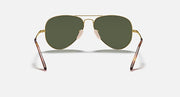 Gold aviator metal sunglasses with dark green lenses and angular temple ends