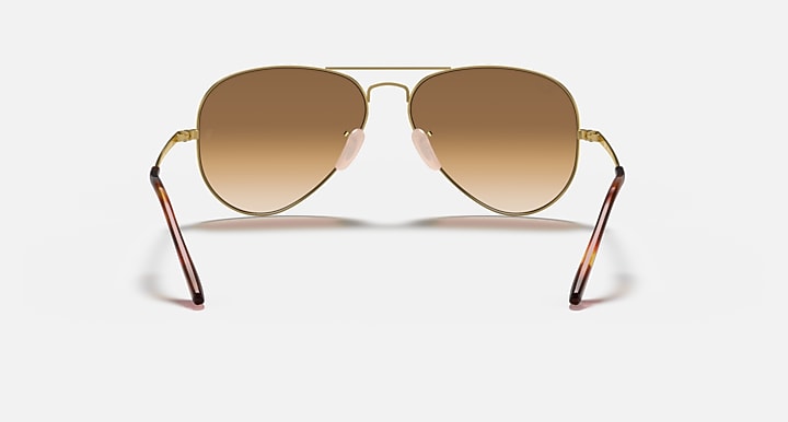 Ray-Ban aviator metal sunglasses with brown lenses, gold frame and tortoise temples
