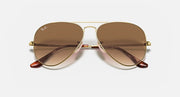 Ray-Ban aviator metal sunglasses with brown gradient lenses and gold metal frame