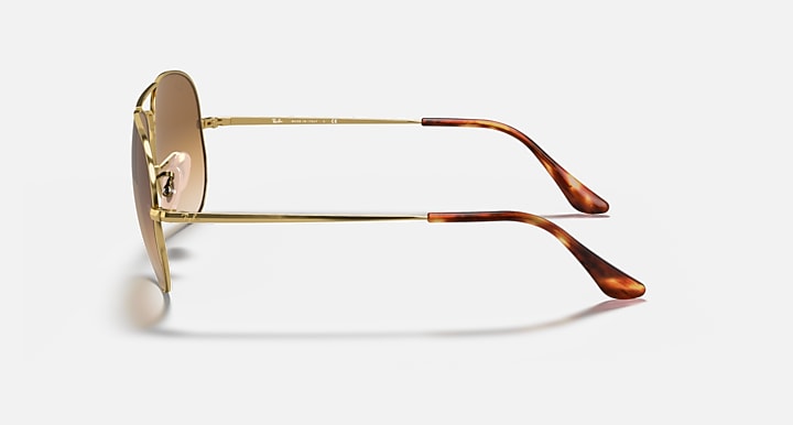 Ray-Ban Aviator Metal II sunglasses, side view, gold frame with amber-brown lenses