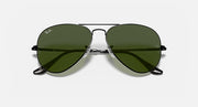 Ray-Ban aviator metal sunglasses, dark green lenses, black frame, front angled view