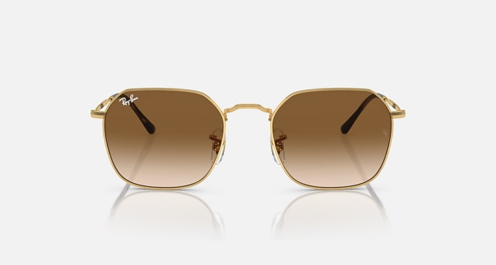Metal sunglasses with gold frame and dark brown lenses; front view.