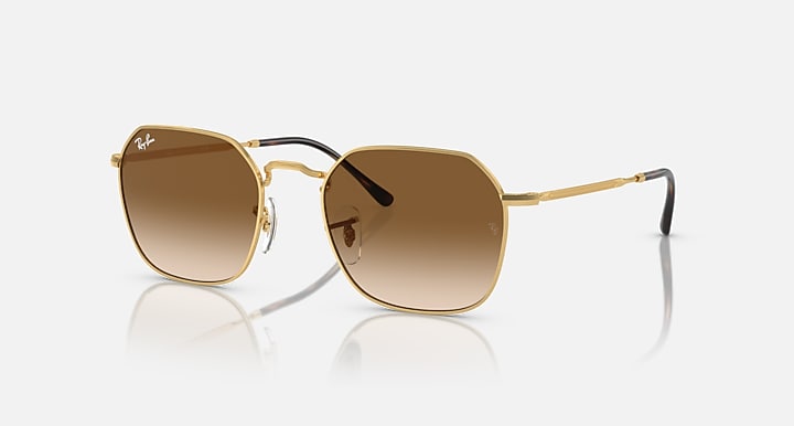 Metal sunglasses with gold frame and brown gradient lenses; front view.