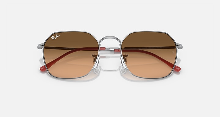 Ray-Ban Jim sunglasses top view: silver frame, brown gradient lenses, red inner arms