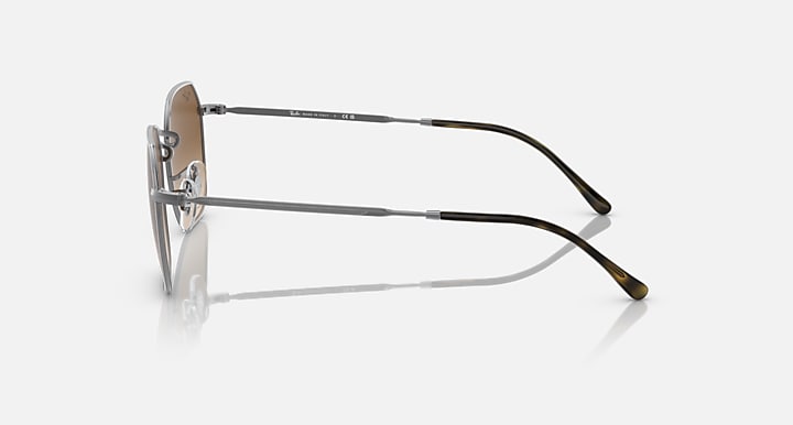 Square sunglasses side profile with silver frame and brown gradient lenses