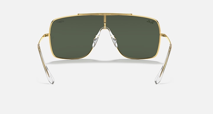 Front view gold-tone sunglasses with dark green lenses and hinged metal arms