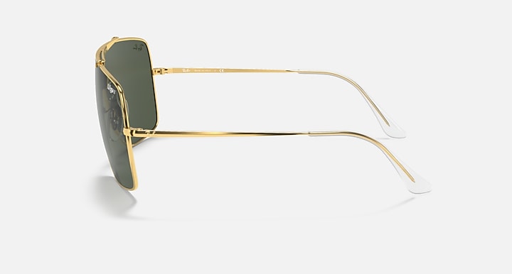 Side-view gold-tone sunglasses with dark green lenses and clear temple tips