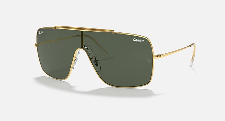 Gold-tone aviator sunglasses with dark green lenses and slim metal temples