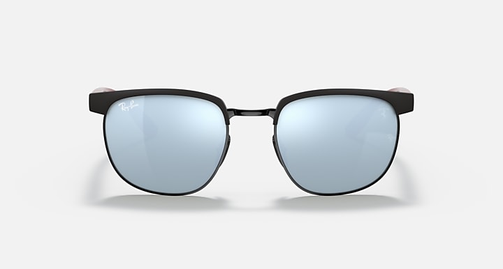 Ray-Ban RB3698M sunglasses with matte black frame and light blue mirrored lenses