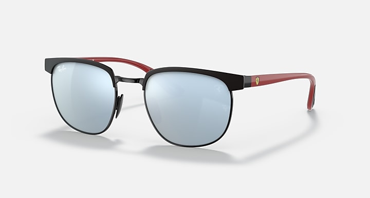 Ray-Ban RB3698M sunglasses with matte black frame and light green mirrored lenses